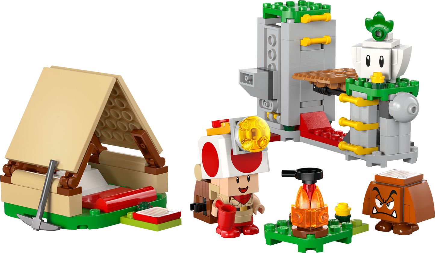 LEGO set with a small hut, character, and other elements on a white background.