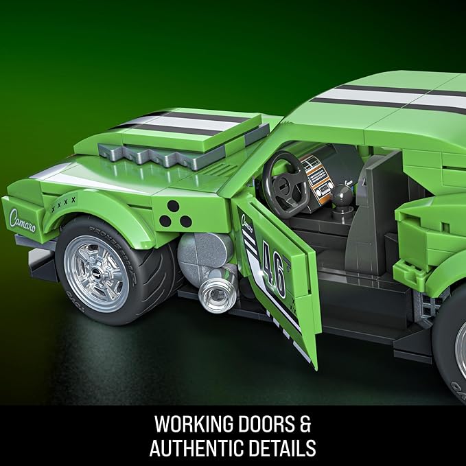 Green toy car with open doors on a dark green background