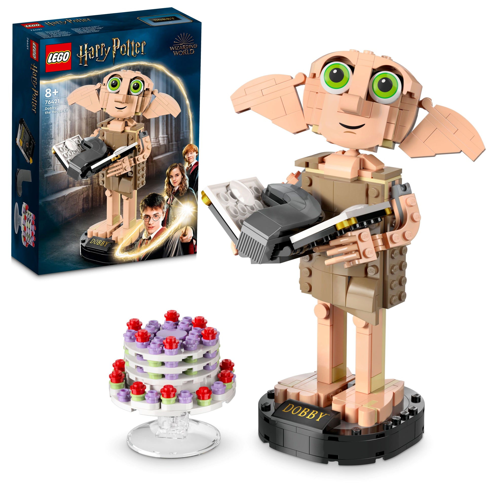 LEGO Dobby the House Elf set with packaging and cake on a white background