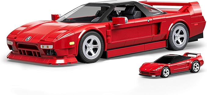 Red sports car model made of interlocking bricks on a white background