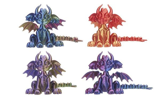 Four colorful dragon figurines on a white background