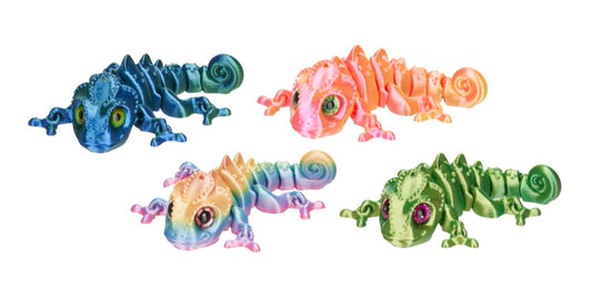 Four colorful toy lizards on a white background